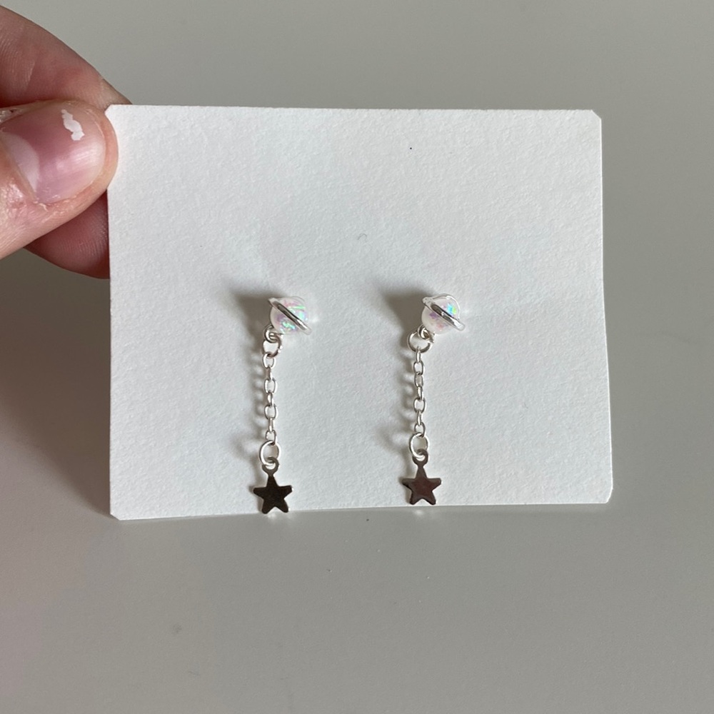 Planet dangle earrings